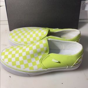 Neon green slip on vans